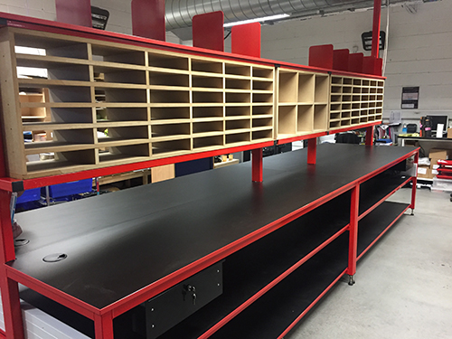 Mailout Bench custom workstation for optimising packing processes