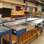 bespoke industrial workbench benefits shown in packing station