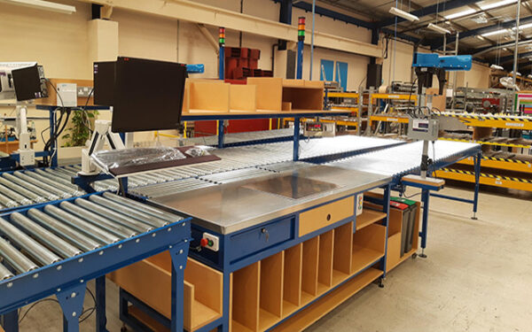 bespoke industrial workbench benefits shown in packing station