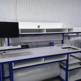packing bench with roll holder and cutter