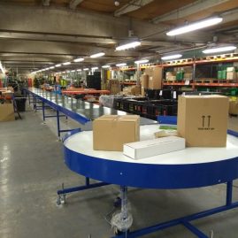 rotary table and belt conveyor in warehouse