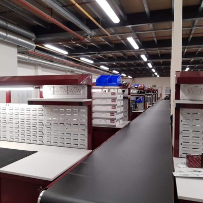 assembly line workbenches and belt conveyor