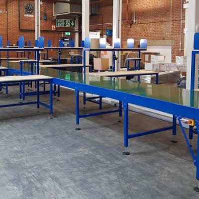 conveyor with packing benches