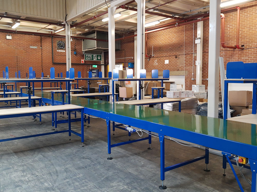 belt conveyor line with packing tables