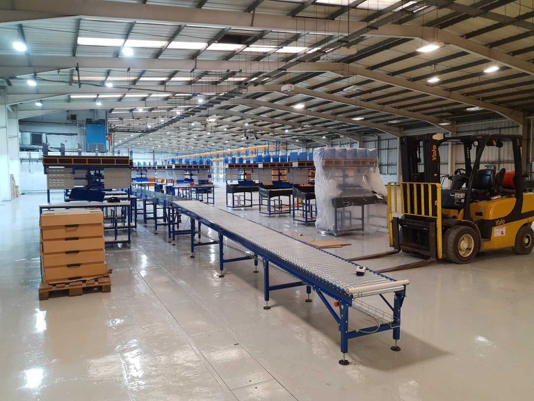 Installing a packing line conveyor belt with bespoke benches