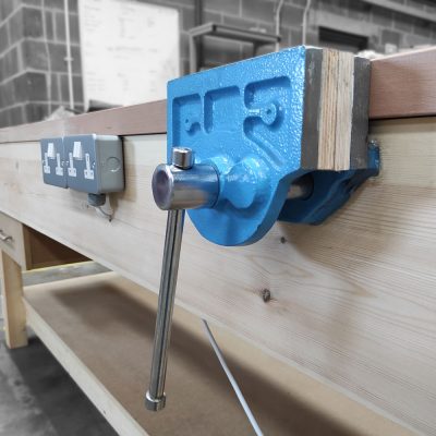 Wooden workbench with vice