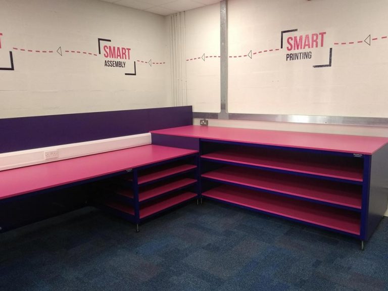 Desks made bespoke to match the company colours